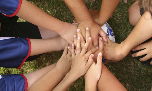 Children having team gathering